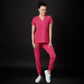 Immagine di una Medica o Dottoressa che indossa una Divisa Sanitaria  Fucsia, modello Urs, della marca Gallantdale, specializzata in abbigliamento sanitario.